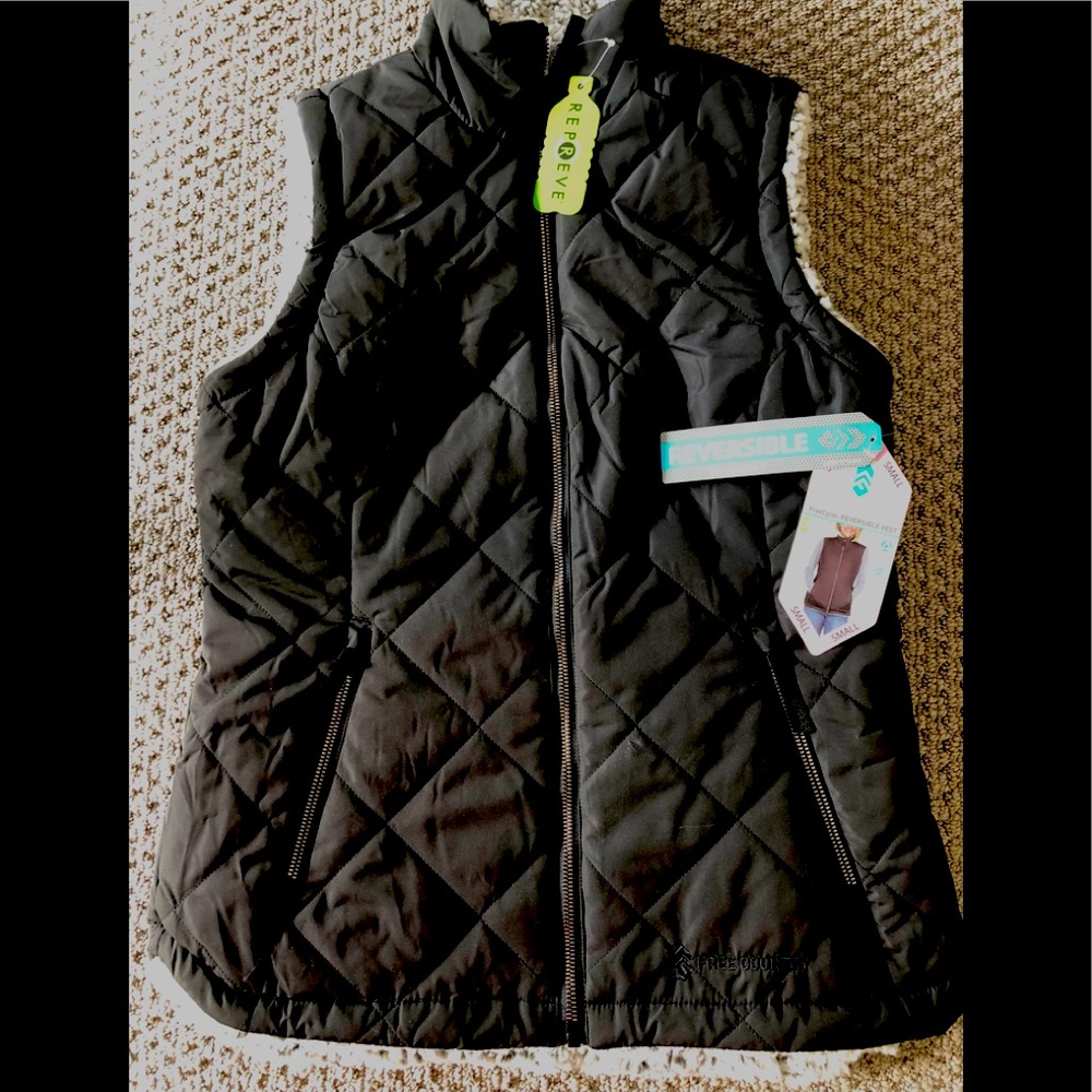 Reversible Insulated Vest.. Faux fur lined. Repreve